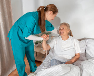 health professional woman with a senior woman